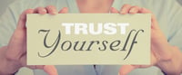 Trust2 - Closeup businesswoman hands holding white card sign with core values text message isolated on grey wall office background. Retro instagram style image